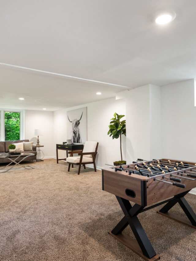 Cropped - Game Room - Foosball Table, Wooden Chairs, Plant, White Walls