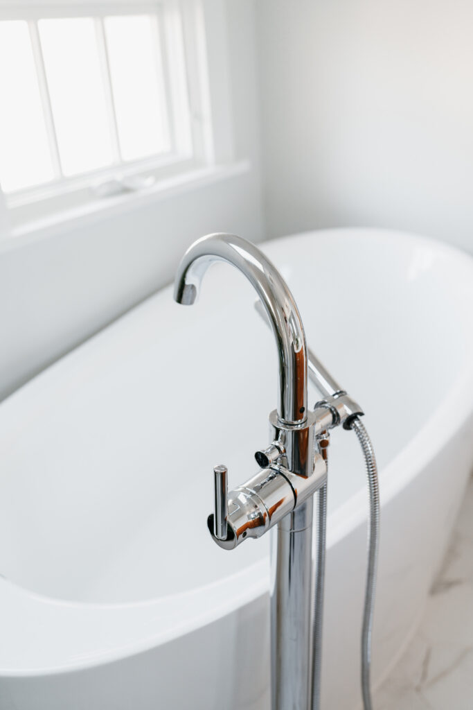 Delta Trinsic Floor Mounted Tub Filler with Integrated Diverter and Hand Shower - Less Rough In