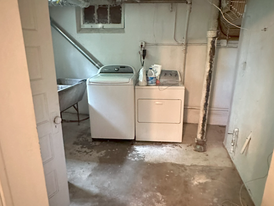 Unfinished laundry room in basement. Located in linden hills, minnesota